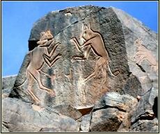 The Fighting Cats, rock relief of Wadi Methkandoush.