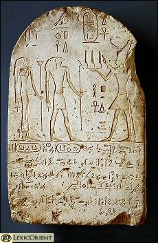 Stele of Shabaqo (right) making offerings to the god Horus and goddess Wadjet (left).