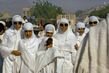 Female ihrams with sun glasses.